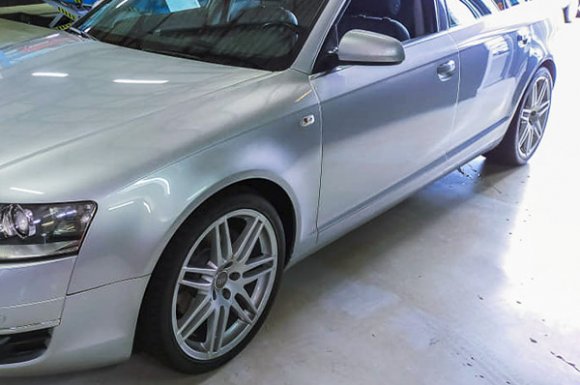 Garage automobile pour changement plaquettes de frein Audi au Tampon